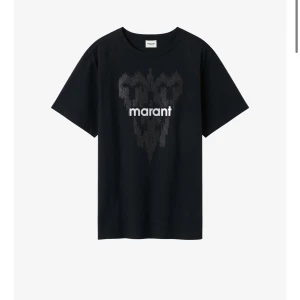 Marant tröja - Super fin glittrig marant t-shirt. Inprinsip helt ny bara andvänd ca 2 gånger. Säljer då den inte kommer till andvändning. Köpt på NK för 2100kr för ca tre månader sedan!