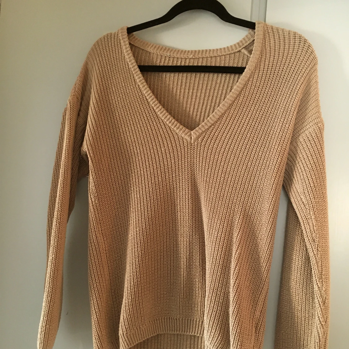 Stickad tröja medium