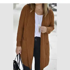 Soft cardigan, camel color from Toby online.  Size small/medium but fits oversized. Very soft and comfy! 