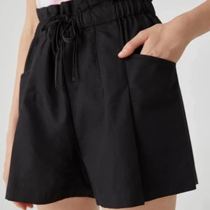 PULL & BEAR DRAWSTRING SHORTS XS/S - Loose-fitting paperbag Bermuda shorts with drawstring elastic waistband and pockets. Cotton blend. Mid to high waist depending on height. Metal hardware capping the drawstring. Gently used excellent condition. No holes, tears, rips, stains, snags, fading,
