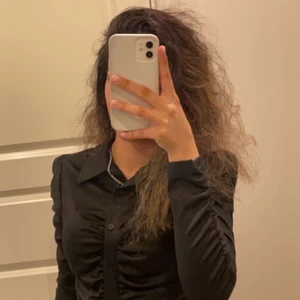 Buttoned up shirt - Very pretty shirt with stretchy material. Only wore it one time. Can be styled. Don’t pay with Plick safepay