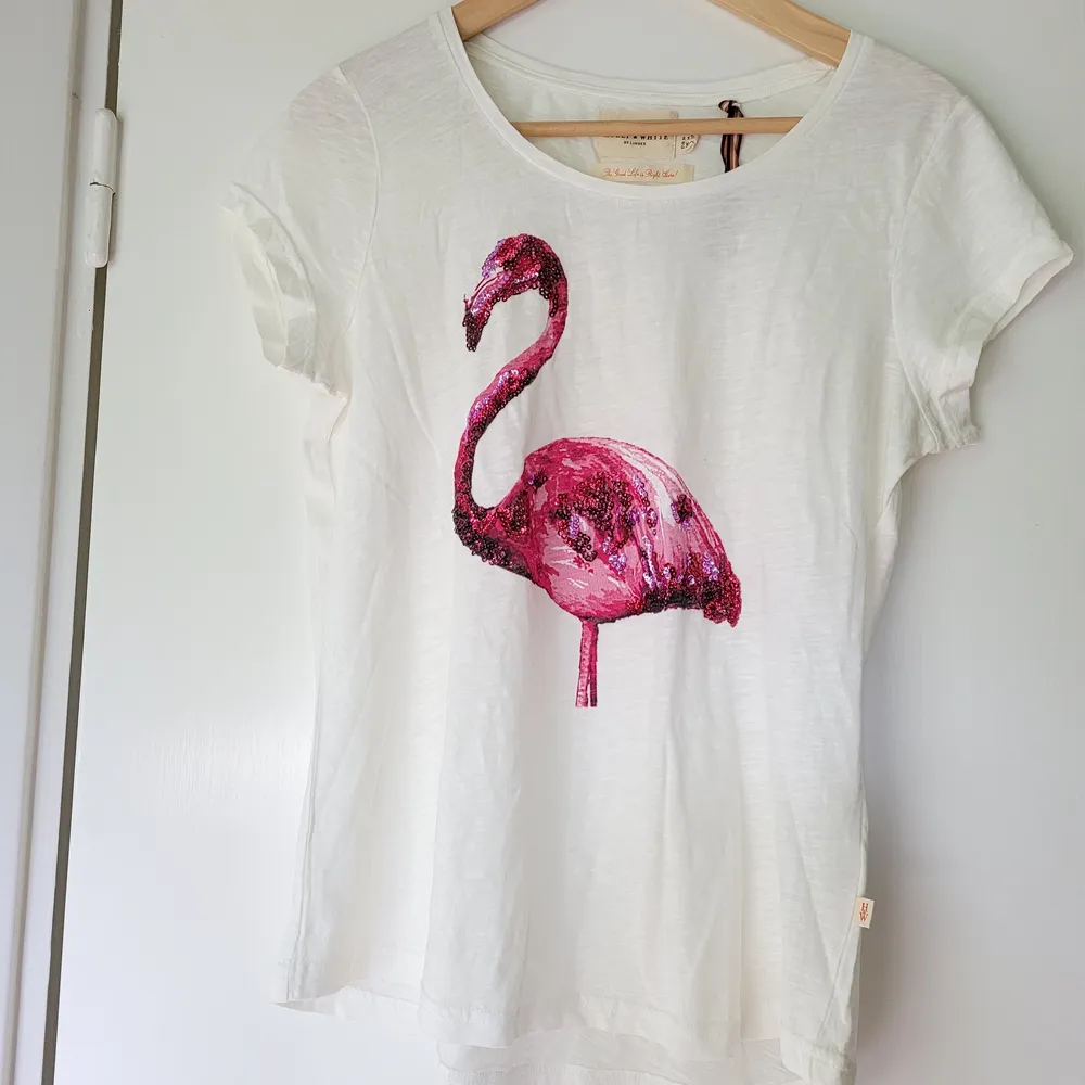 Rolig skön tshirt/topp stlM, motiv: Flamingo med paljetter. Bomull Ny, aldrig använd! . T-shirts.