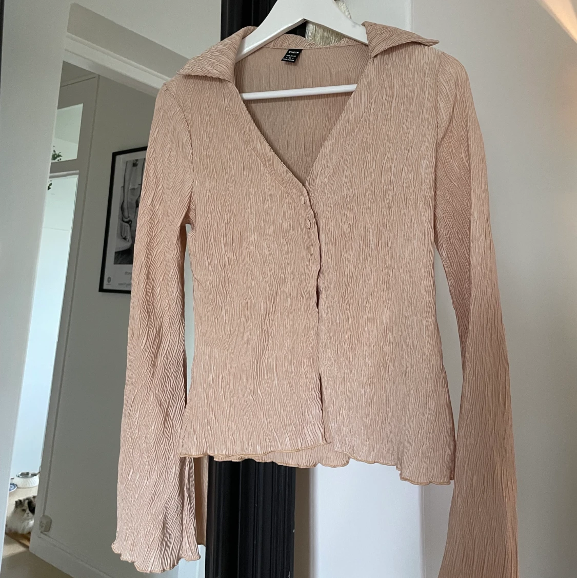 Tröja med klockade ärmar