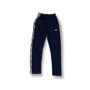 Joggers från Fila - Sport joggers från Fila i färgen Marinblå. Passar Storlek S/M