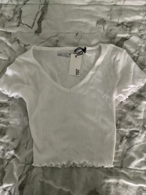 Oanvänd topp - Köpt på lager 157, aldrig använd