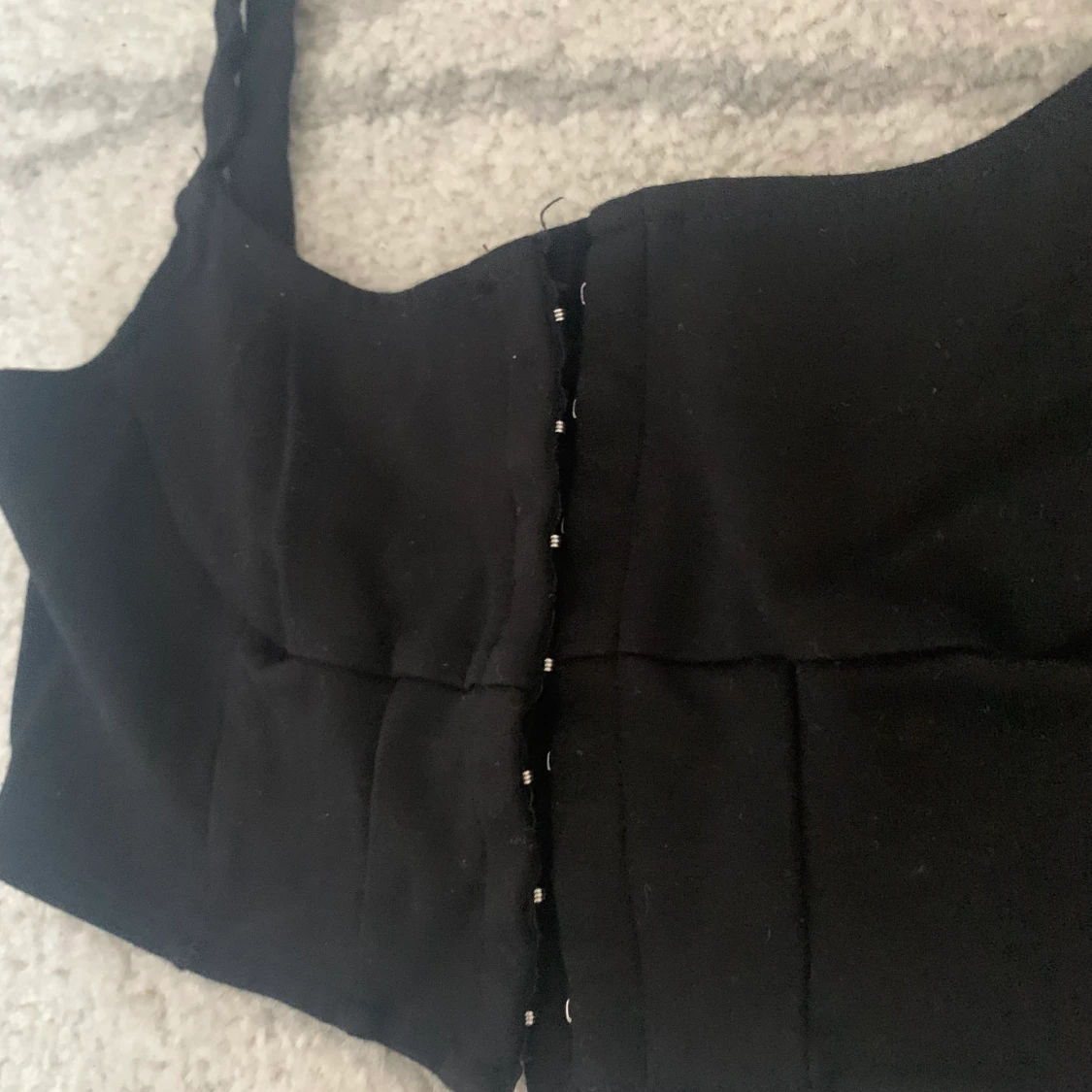 Svart korsettliknande topp - 90