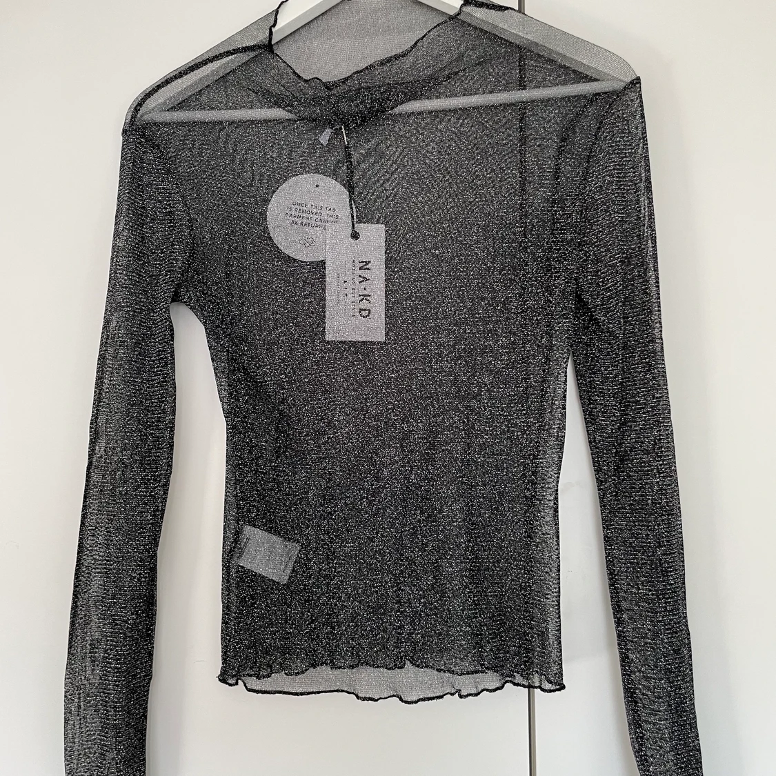 Glittrig festtopp från NAKD - 90