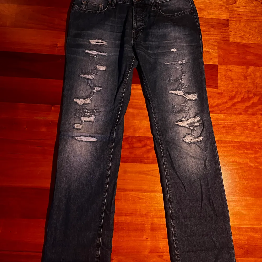 Ett par vintage Boss Orange (Hugo Boss) jeans.. Jeans & Byxor.
