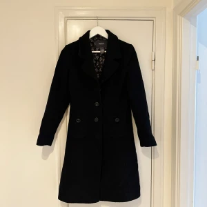 Svart kappa - Fin svart kappa 