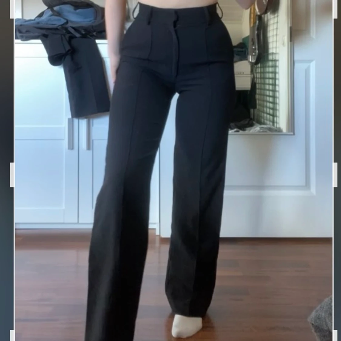 Svarta kostymbyxor