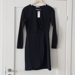 Black Dress - Black dress, never worn with tag attached.