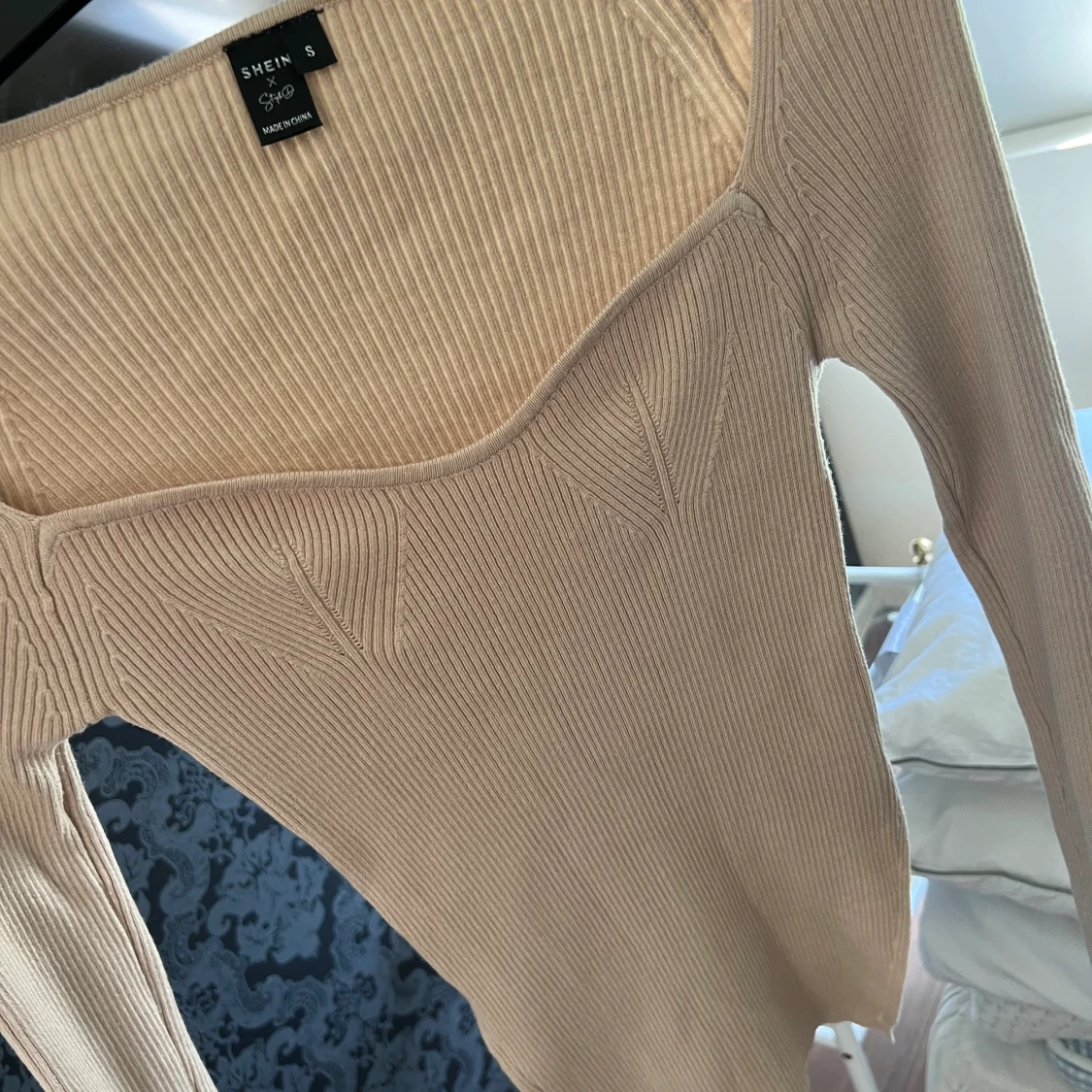 Storlek S skulle passa Xs 