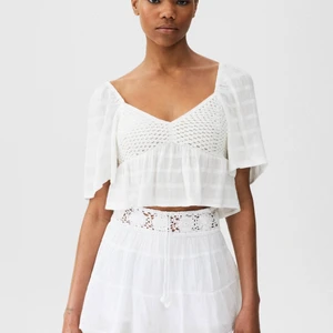 Blus - Fin topp/blus med fin virkning.  Ej använd endast testad. Storlek S 