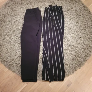 Två par fin byxor - Svart stl s randiga stl 38