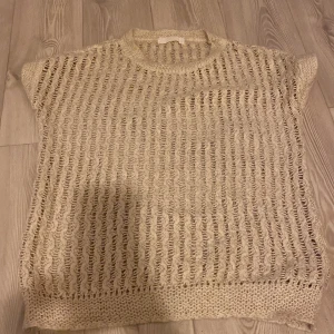 Knitted short armed top  - Good condition 