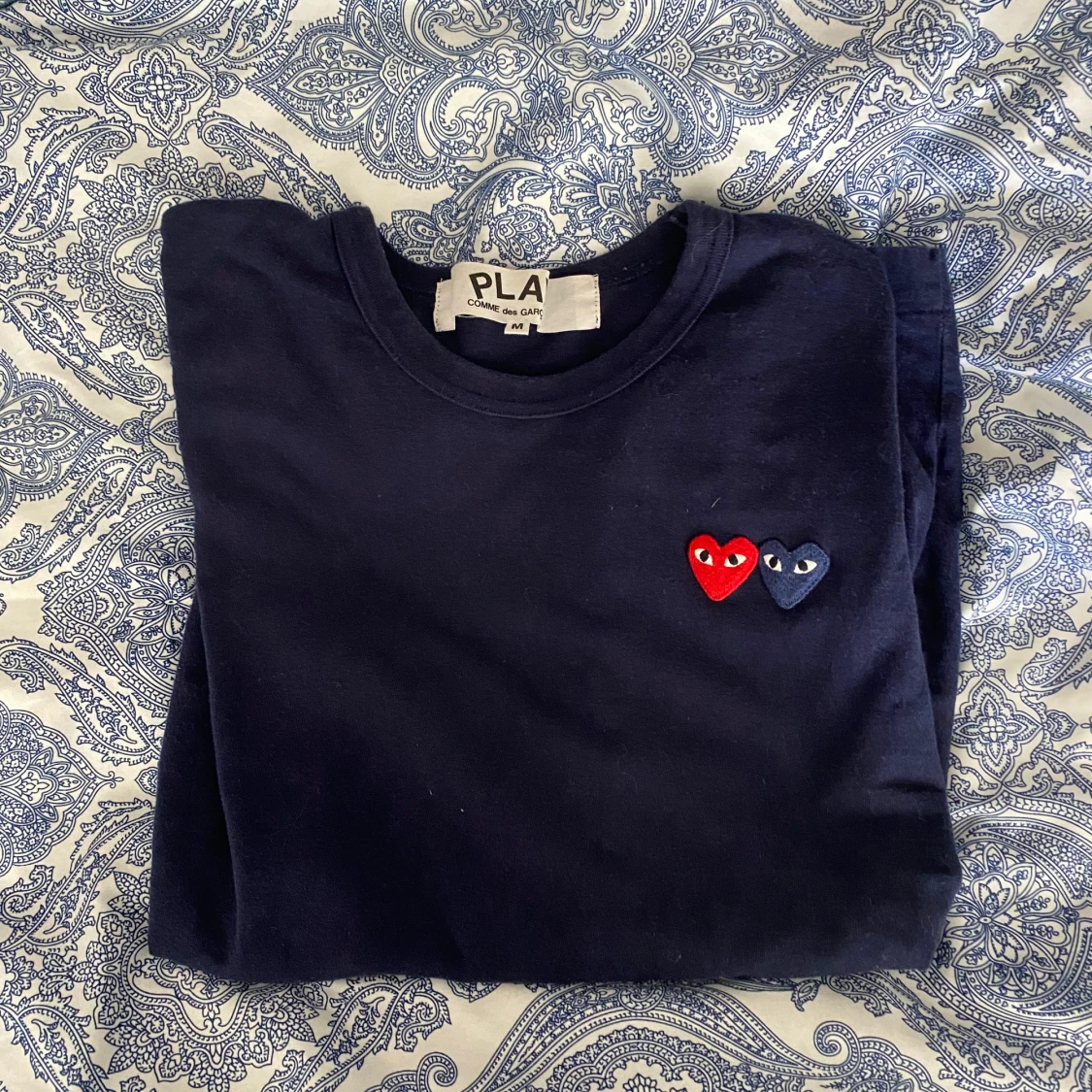 CDG storlek M