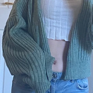 Grön kofta - En grön kofta som inte kommer till användning längre.