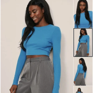 Blå långärmad topp från nakd S - Blå långärmad ribbad topp från Nakd. Storlek S. Nyskick. Köpt för 200, säljs för 50. Passa på medan frakten är gratis!💕