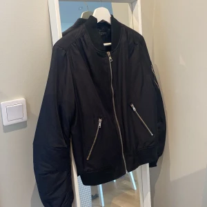 Topshop Nylon Bomber Jacket - Nylon bomber jacket from Topshop with zip detail. Slight mark on collar as seen in images