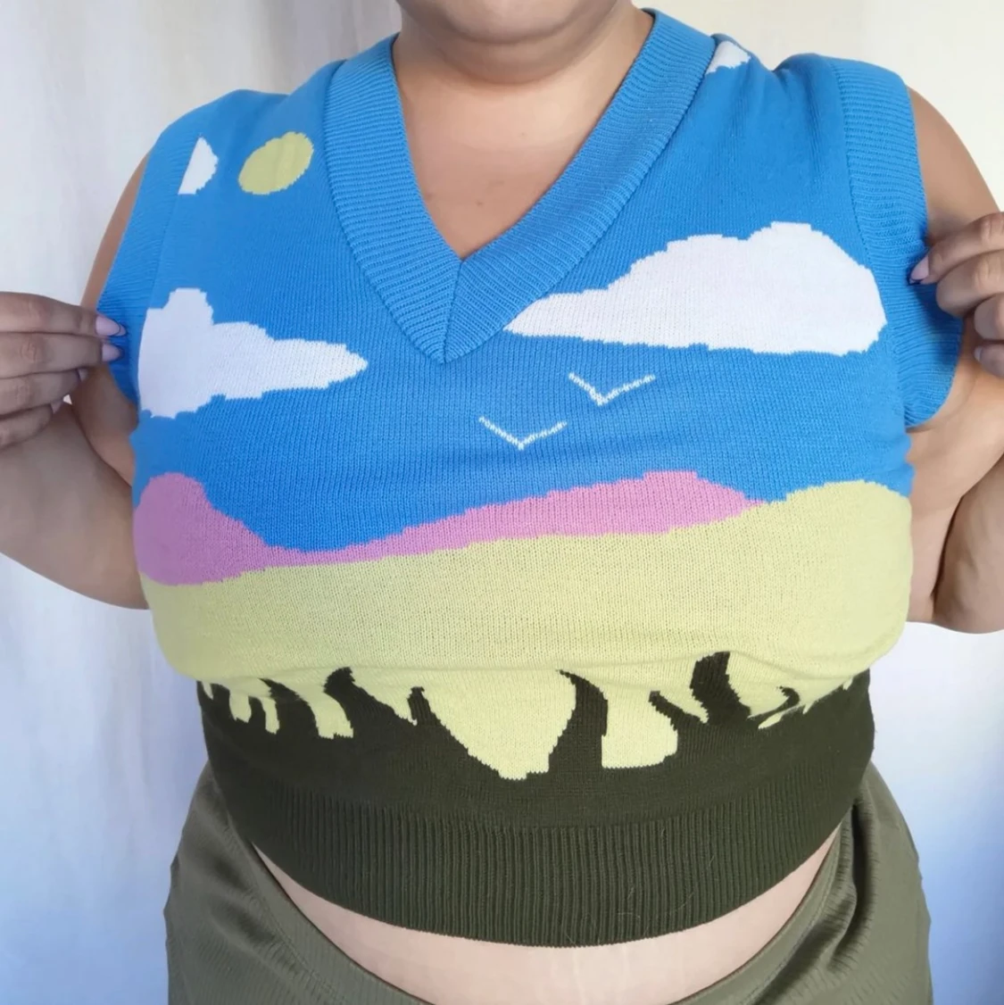 Stickad väst med motiv