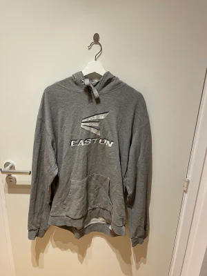 Hoodie grå  - Grå hoodie från hockey märket easton 