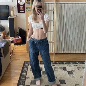  Baggy jeans  - Snygga Jeans som aldrig använts.  Midjemått är 73,5 cm