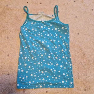 Linne med stjärnor och rosett - Fint skick