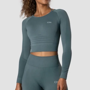 Träningströja - Säljer helt oanvänd träningströja från Icaniwill.  Modell: DEFINE SEAMLESS LS CROP TOP JUNGLE GREEN WMN Storlek: S Säljer även helt oanvända springtights i samma modell. 