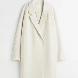 Kappa - Vit/beige kappa från H&M som inte längre kommer till användning. 