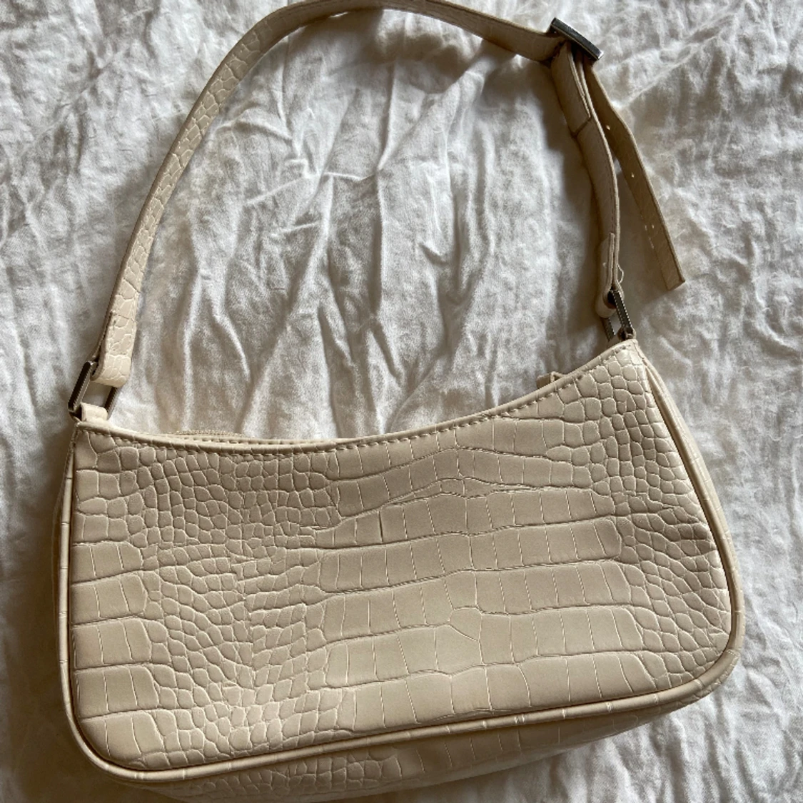 Beige handväska från monki