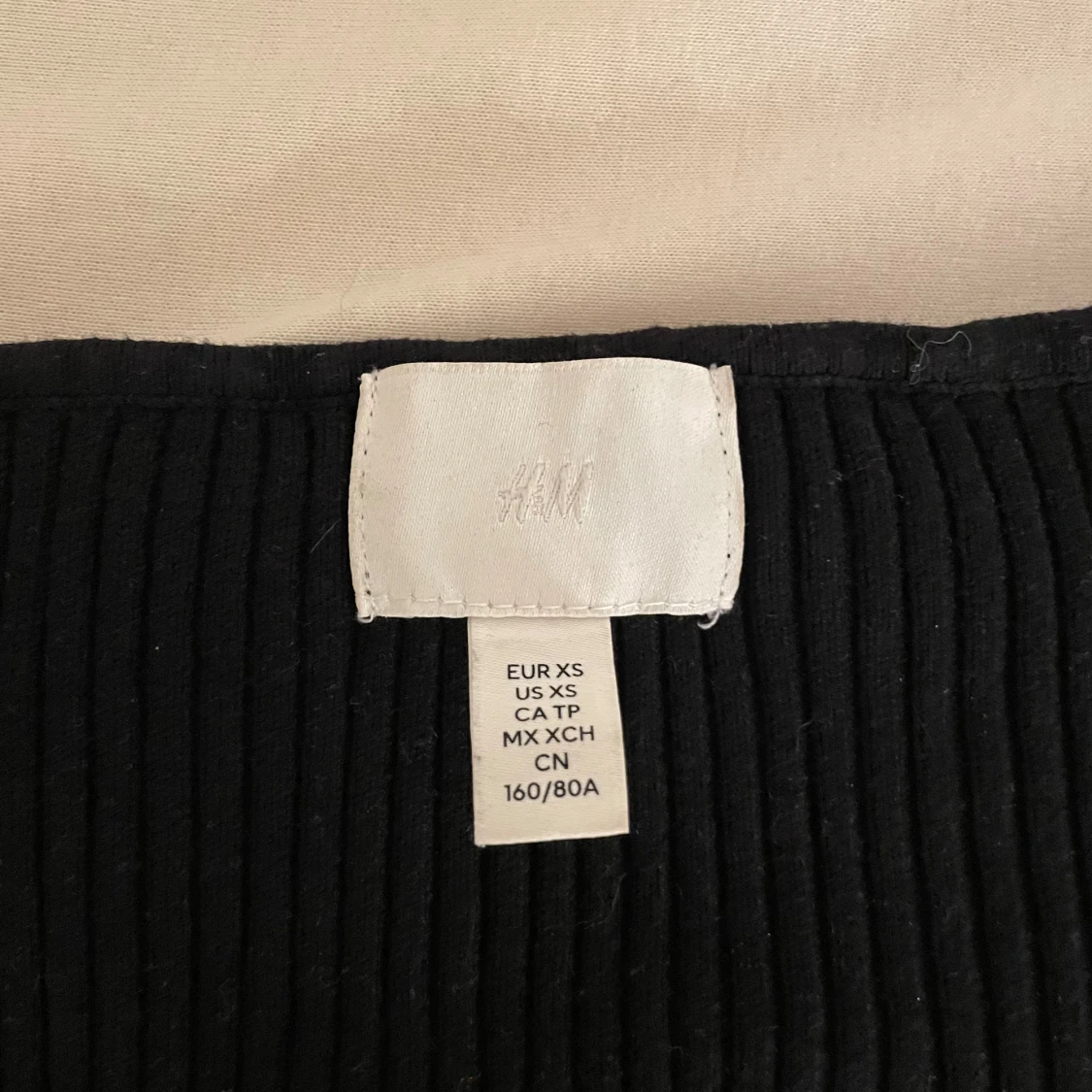 Ribbstickad tröja - 90