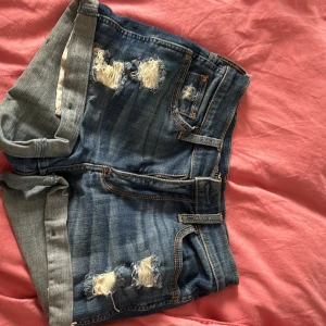 Hollister Denim Shorts - Super cute and comfortable denim shorts with a slight stretch, low/mid rise and very flattering on, size W24 or US Size 0