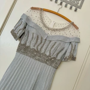 Festklänning  - Helt ny, säljer pga storleken passar ej. Priset kan diskuteras 