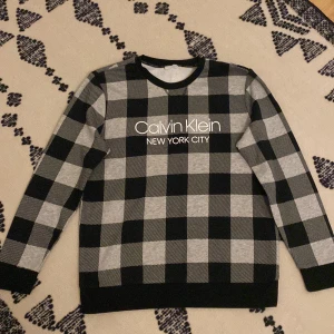 Calvin Klein, Tröja  - Calvin Klein fintröja som aldrig har används.  
