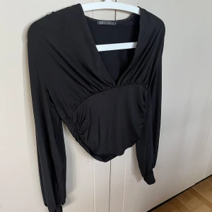 Topp från Nelly - Fin Blus Från nelly som endast används ett par gånger