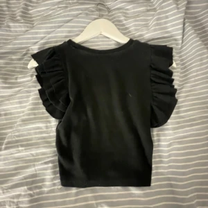 Volang topp - En vanlig volang topp från zara