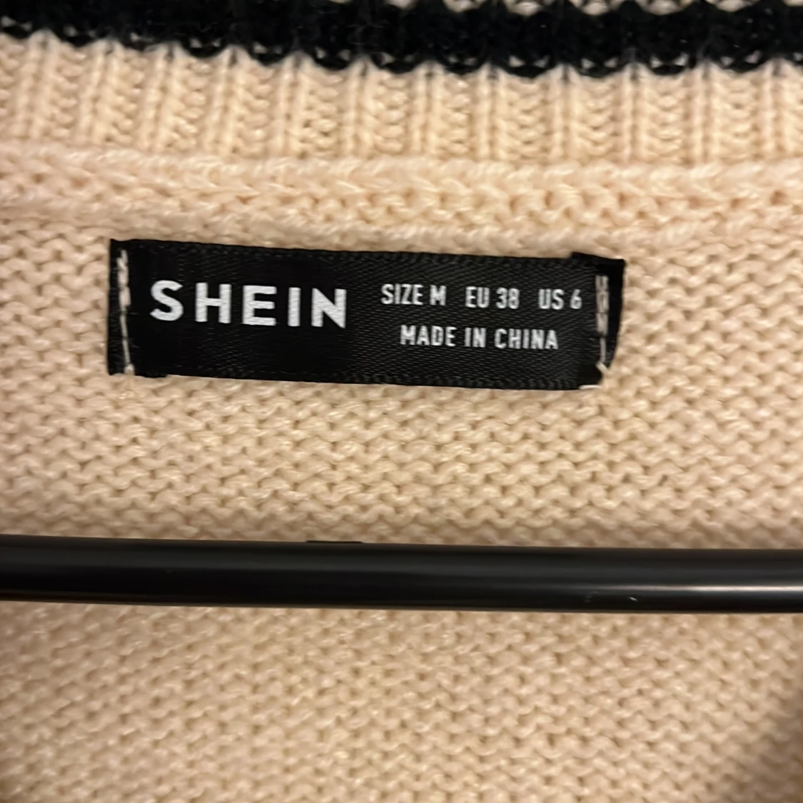 En stickad tröja  - 93