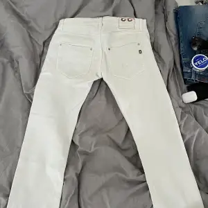 Vita Dondup jeans, storlek 33
