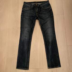Ett par Nudie jeans i regular fit, 33/33