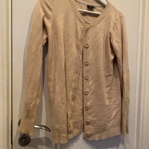 Kofta - Helt ok skick ett litet hål i armhålan 