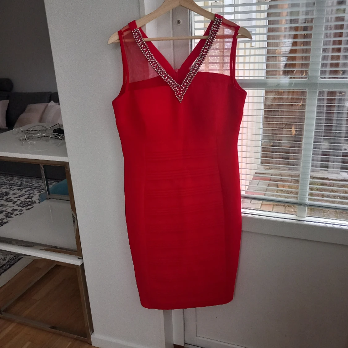 En fin festklänning i Röd färg