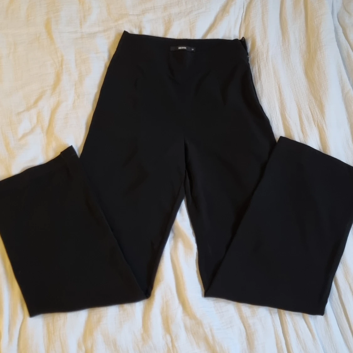 Svarta kostymbyxor 