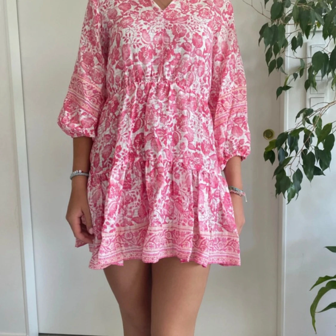 Rosa mönstrad miniklänning 