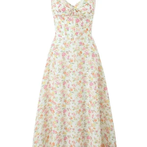 Korsett klänning, helt ny med lapp kvar - Korsett klänning med en benad topp och blommor till detalj. Super söt nu inför sommaren