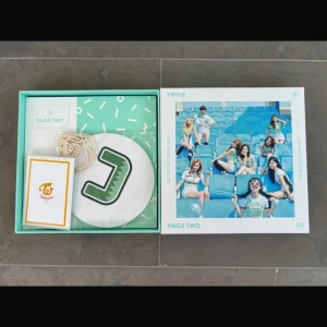 Twice Page Two Album + photo cards  - Twice Page Two album including photo cards of all members but Sana. It also comes with 3 special holographic cards of Chaeyoung, Tzuyu and Nayeon  Condition: Mint 