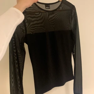 Svart meshtröja - Använd en gång och sen inte kommit till någon användning. 