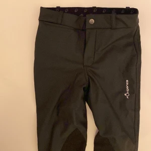 Horse riding trousers - Trousers for horse riding, black. Size 133-142 cm.