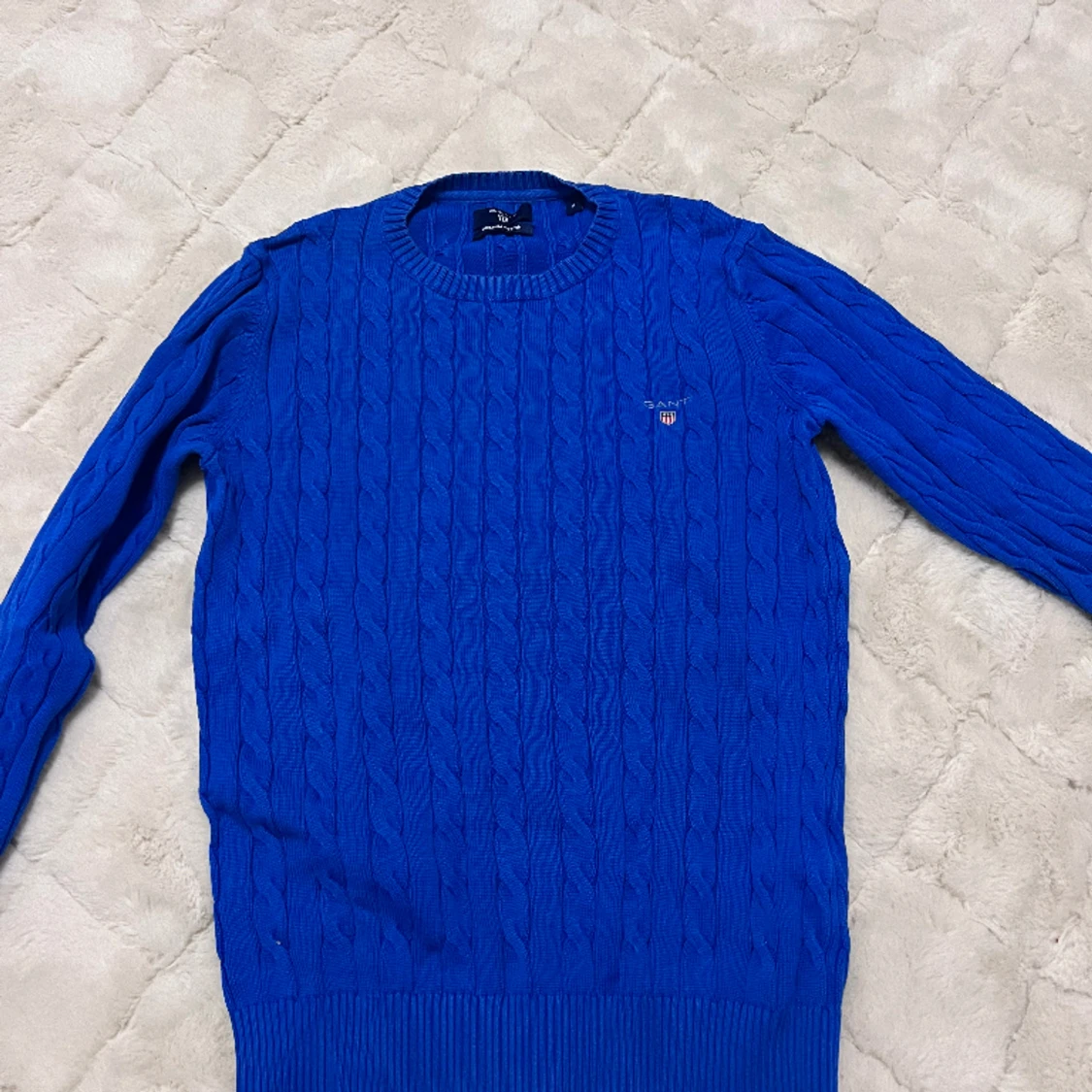 Stickad tröja från märket Gant 