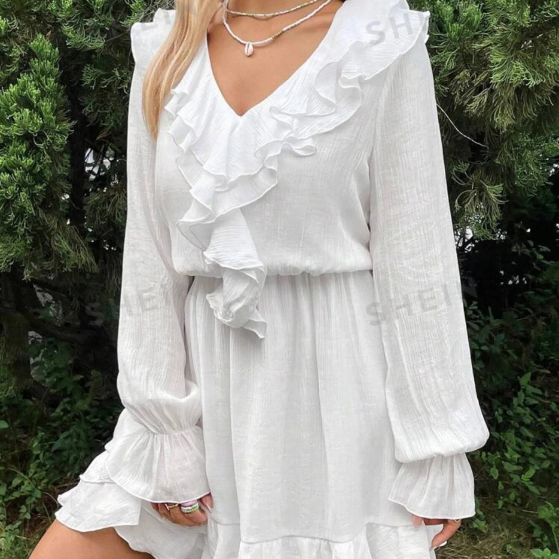 Vit långärmad klänning 