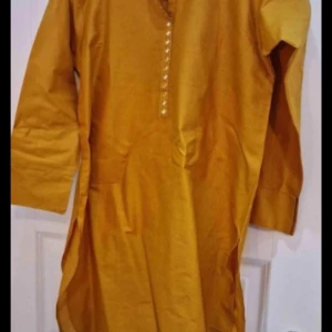 Helt ny klänning  - Helt ny och oanvänd klänning med byxa strl m